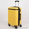 Чемодан-спиннер Grott 338-9108/5-24 (желтый)