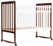 Детская кроватка Bambini Euro Style М 01.10.03 (темный орех/слоновая кость)
