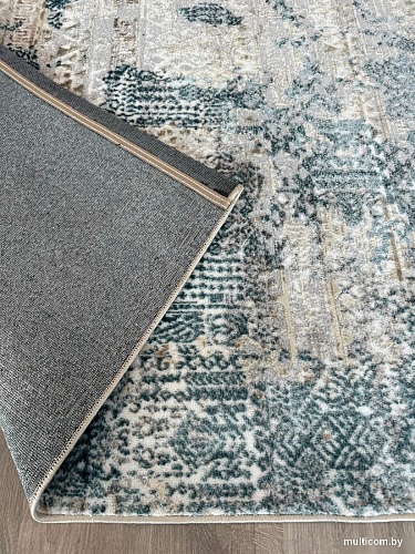 Ковер для жилой комнаты Radjab Carpet Бьянка Прямоугольник D057A 8852RK-B (0.8x1.5, Cream Shirink/Blue Fdy)