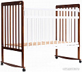Детская кроватка Bambini Euro Style М 01.10.03 (темный орех/слоновая кость)